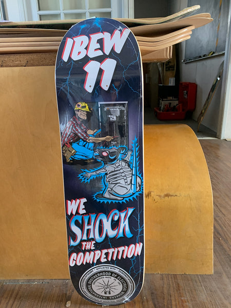 We Shock The Competition skateboard